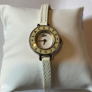 Lacoste watch with white patent leather band.
